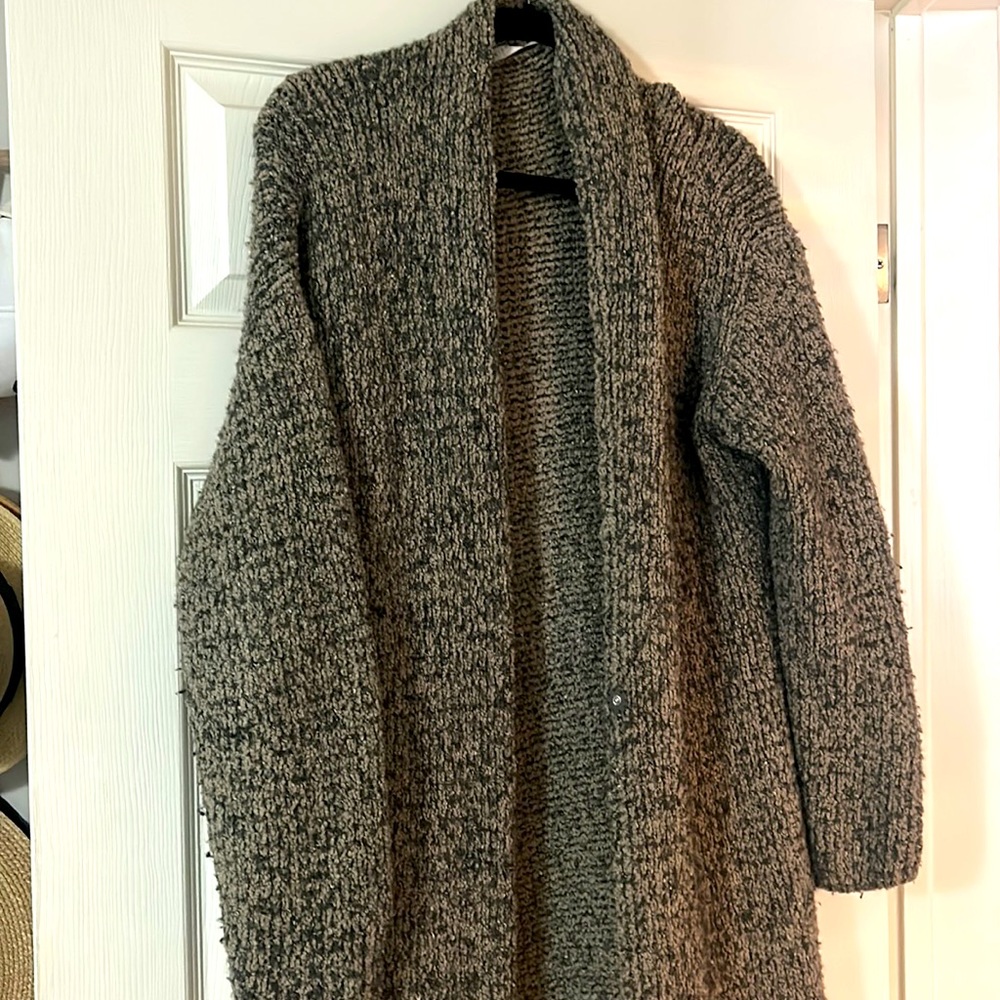 Simply stunning designer duster with pockets and perfect condition.